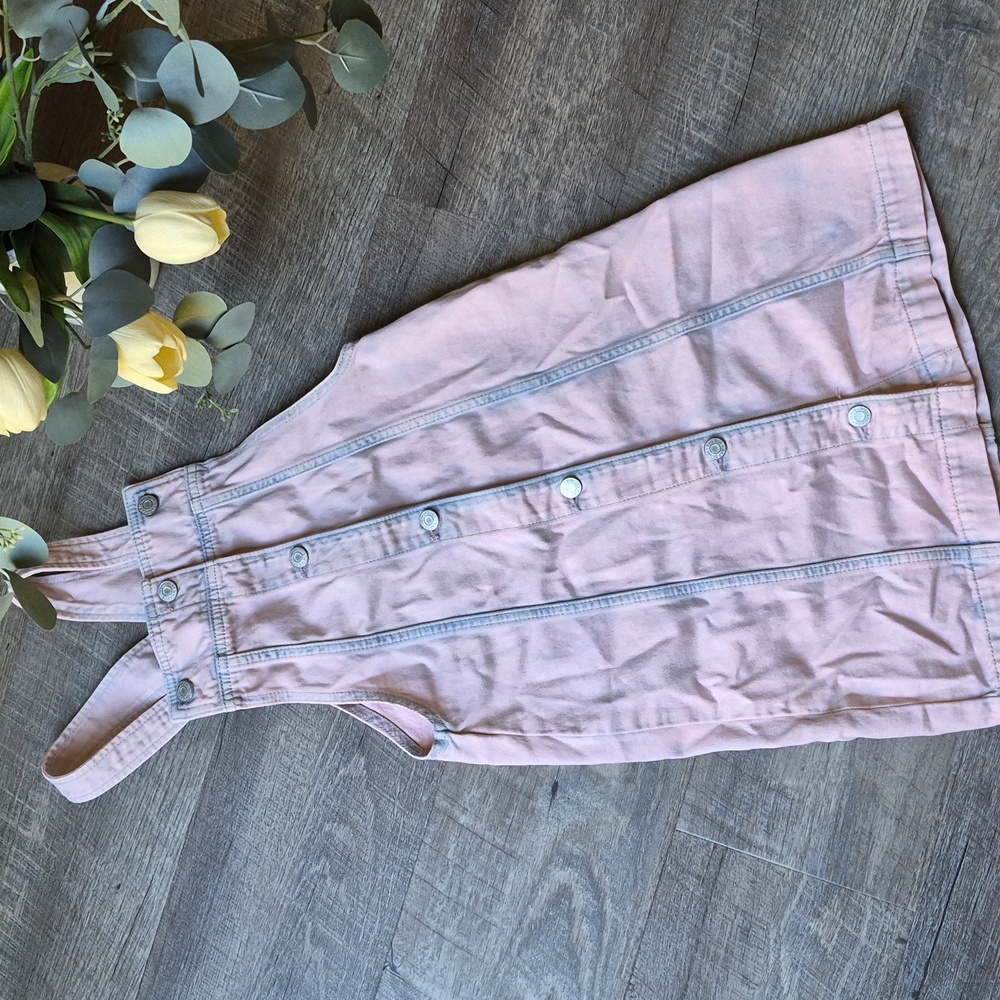 This is a GAP Girl's Pink Denim Overall Dress. Size XL